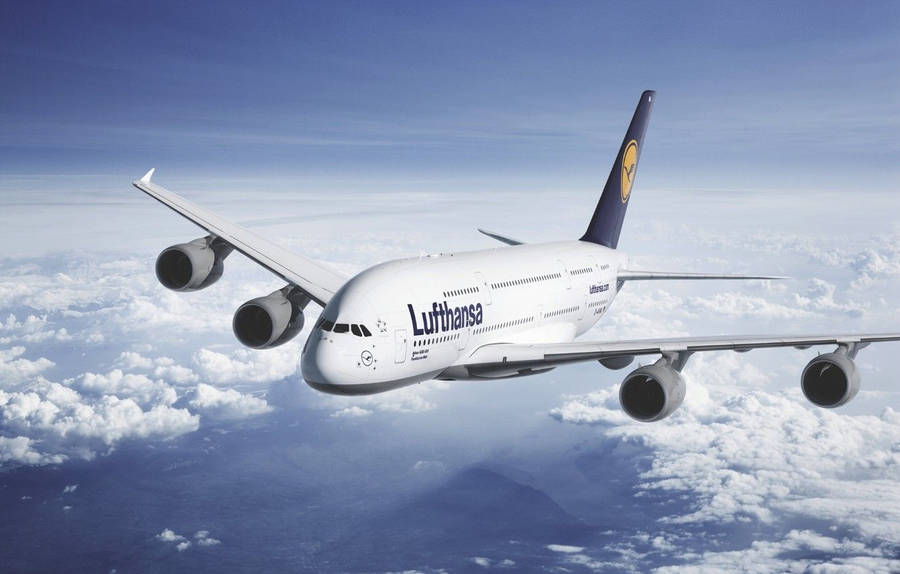 Deutsche Lufthansa Plane On The Blue Horizon Wallpaper