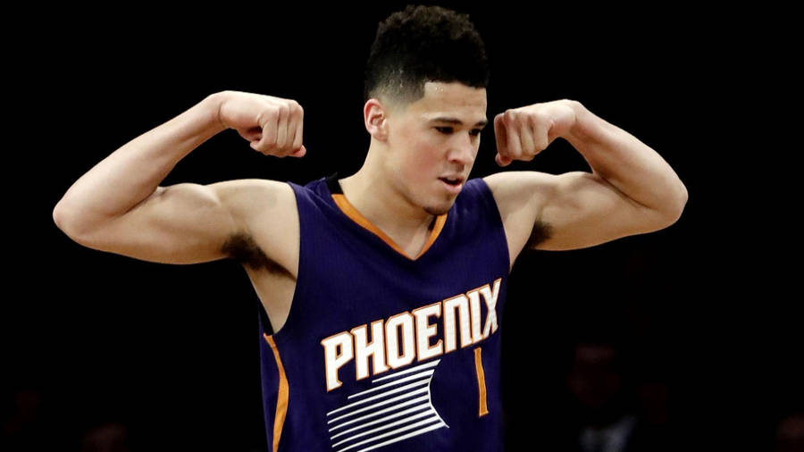 Devin Booker Flexing Muscles Wallpaper