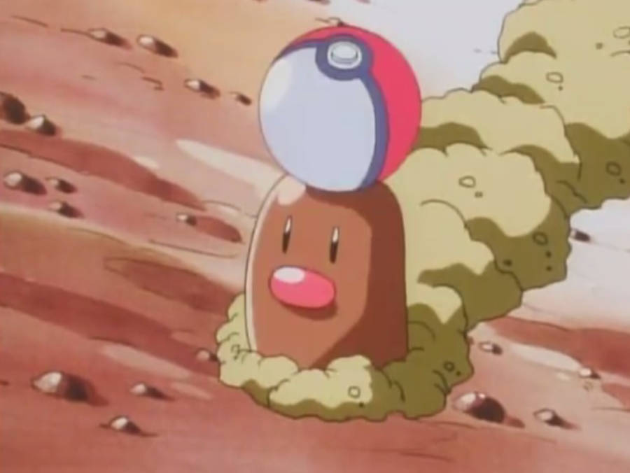 Diglett Pokéball Emerging From Ground Wallpaper