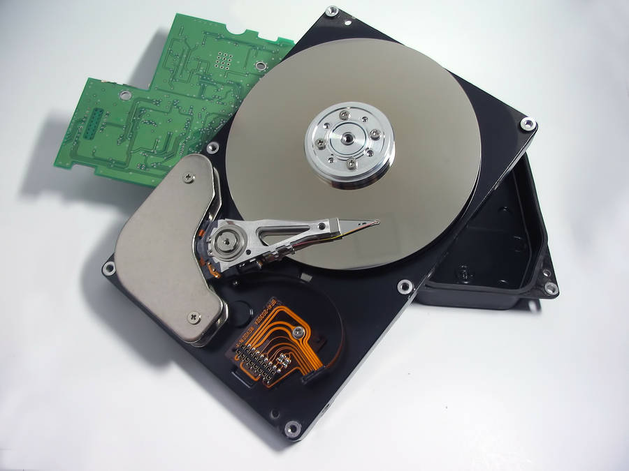 Disassembled Hard Drive From A Top View Perspective. Wallpaper