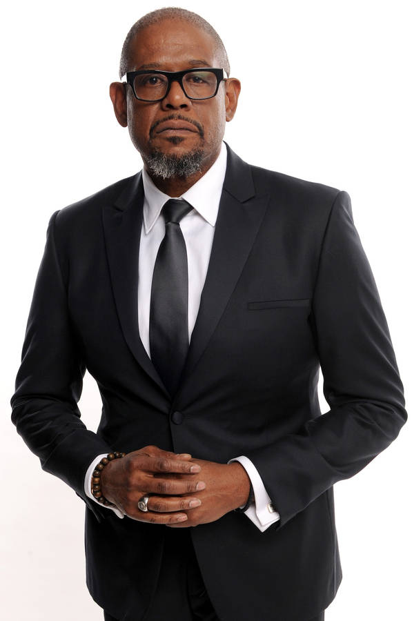 Distinguished Forest Whitaker In A Suit At A Studio Shoot Wallpaper