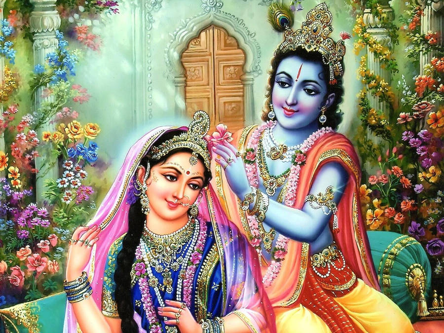Divine Splendor Of Lord Krishna Ji And Goddess Radha Wallpaper