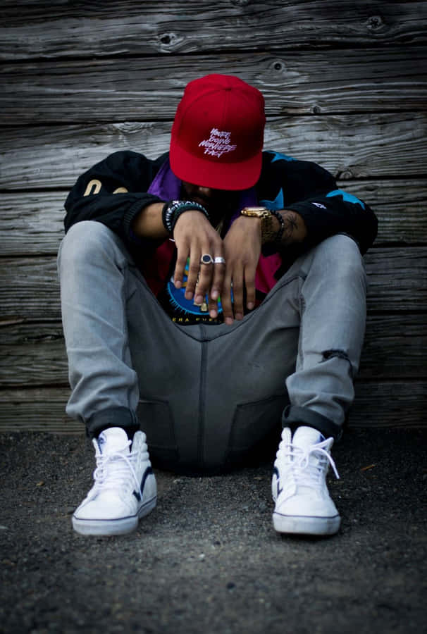 Dope Boy Sitting By The Wall Wallpaper
