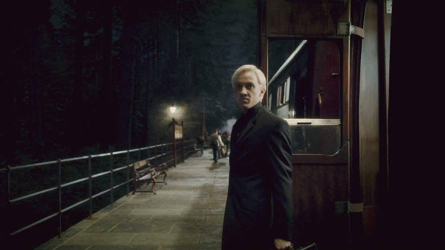 Draco Malfoy In Hogwarts Express Wallpaper