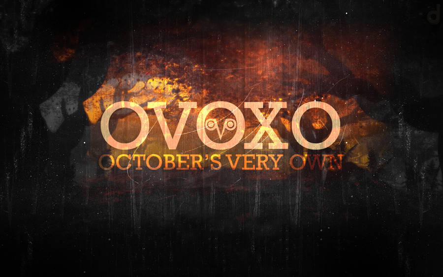 Drake's Gleaming Ovo Logo In The Spotlight Wallpaper