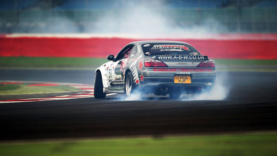 Drift Car On A Wet Track Wallpaper