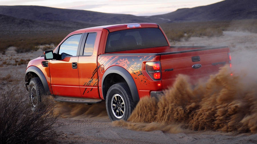 Drifting Cool Truck In Dusty Road Wallpaper