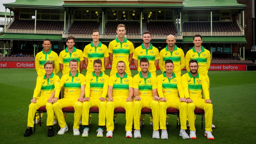 Dynamic Australia Cricket Team In Action Wallpaper