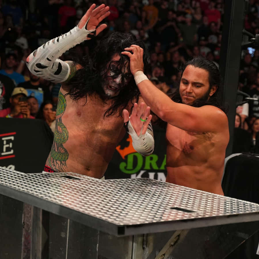 Dynamic Duo Matt Hardy And Jeff Hardy In Aew 2022 Wallpaper