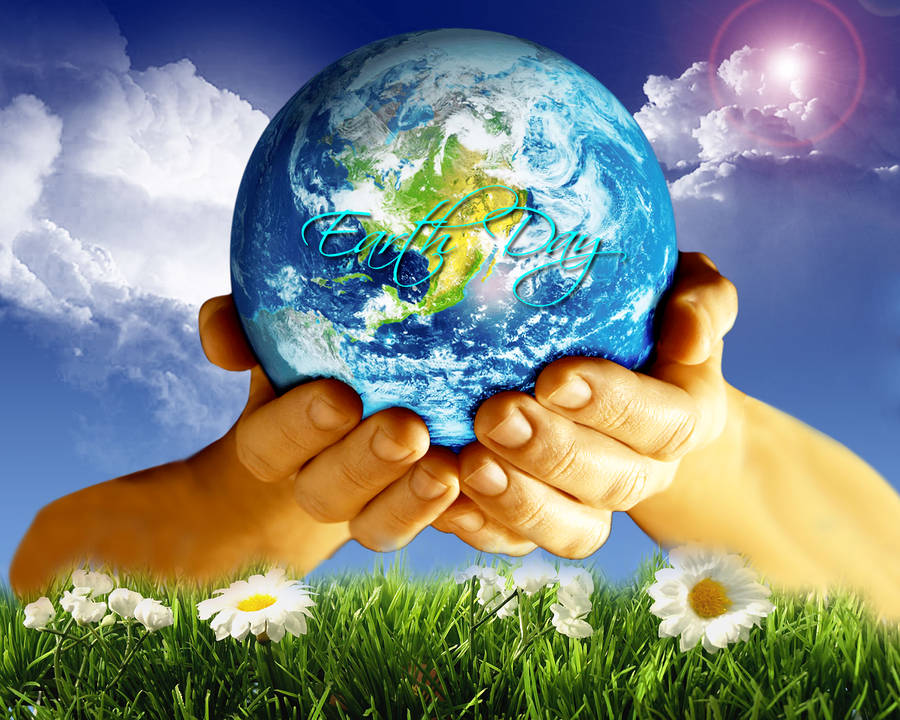 Earth Day Globe In Flower Field Wallpaper