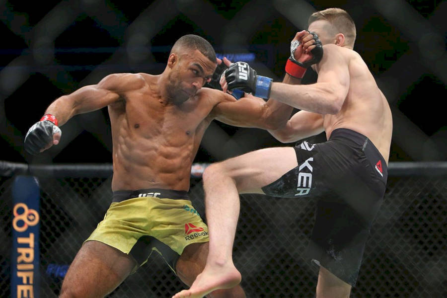 Edson Barboza Striking His Opponent Wallpaper