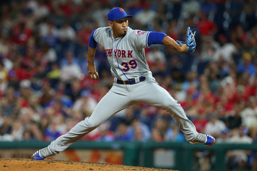 Edwin Diaz Showcasing His Athletic Prowess With A Powerful Stance. Wallpaper