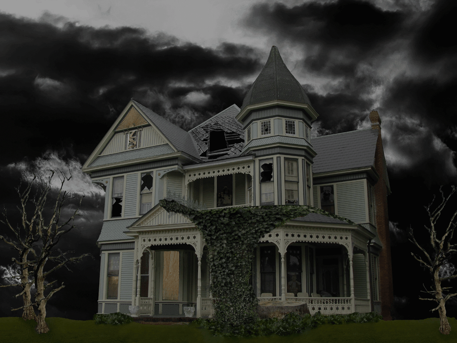 Eerie Haunted House Under Stormy Skies Wallpaper