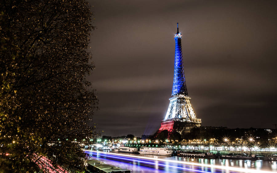 Eiffel Lights And France Flag Wallpaper