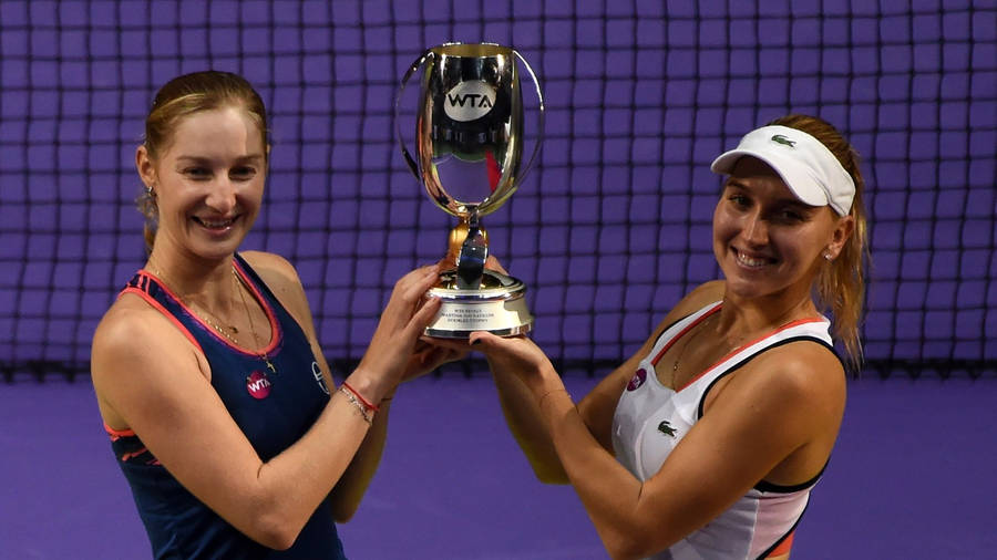 Ekaterina Makarova Elena Vesnina Presenting Trophy Wallpaper