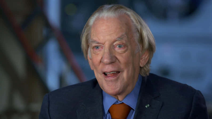 Elderly Actorin Blue Suit Wallpaper