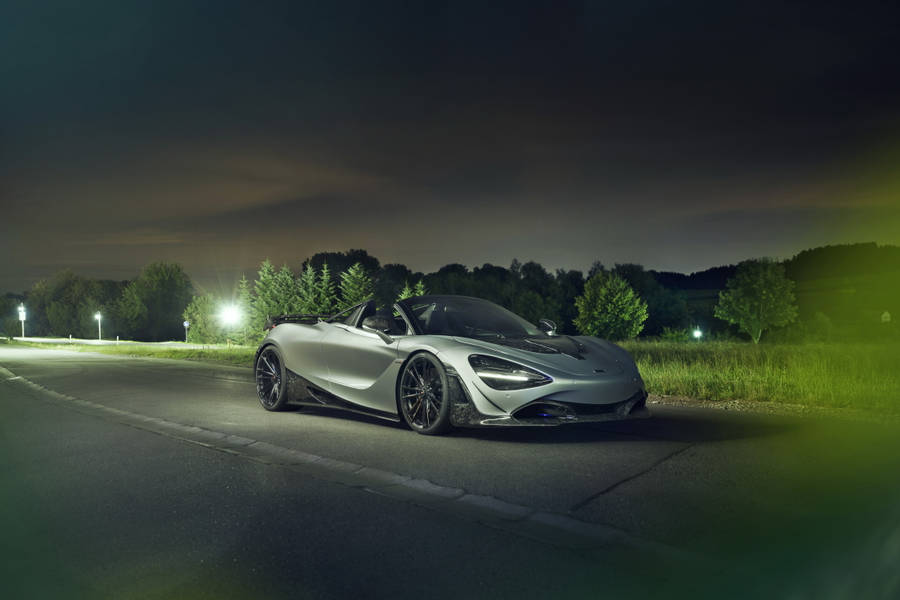 Elegance In Motion: Mclaren 720s Luxury Supercar Wallpaper