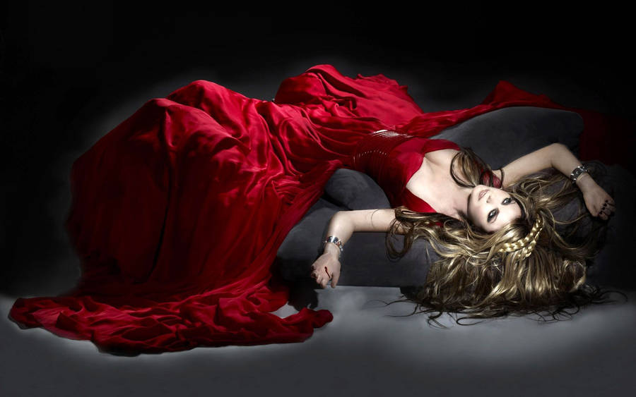 Elegance In Red - Woman In Glamorous Red Satin Dress Wallpaper