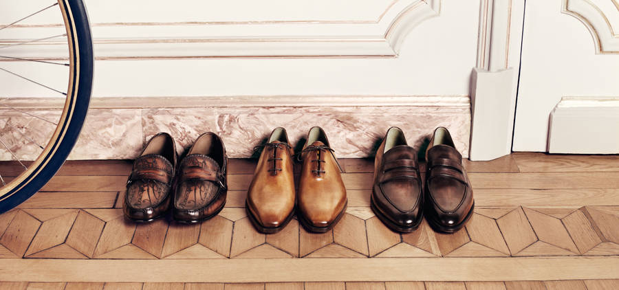 Elegant Berluti Men's Shoes On Display Wallpaper