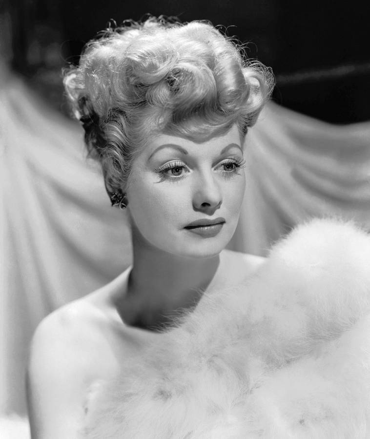 Elegant Lucille Ball In A Fur Gown Wallpaper