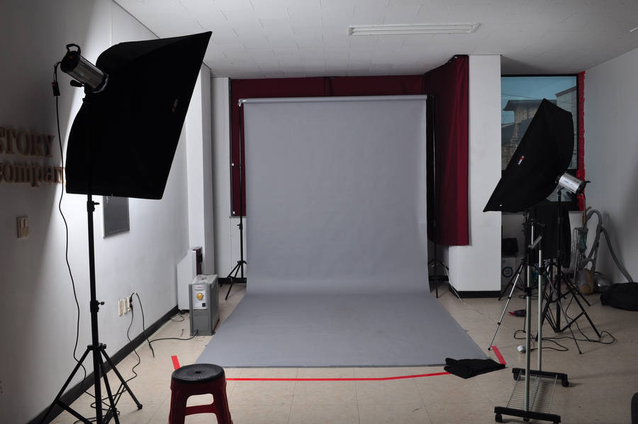 Elegant Photography Studio With Professional Equipment Wallpaper