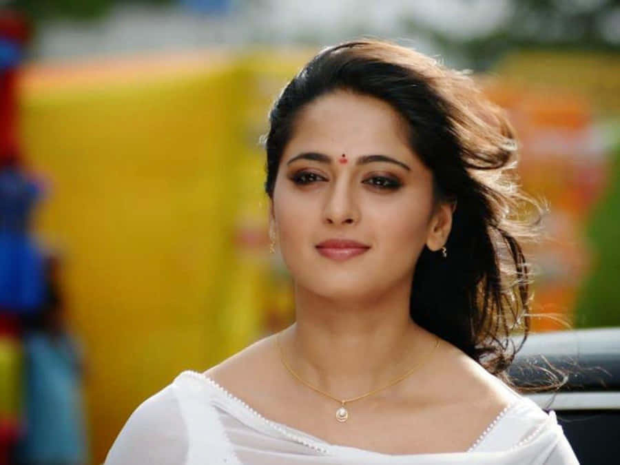 Elegant White Attire Anushka Shetty Wallpaper