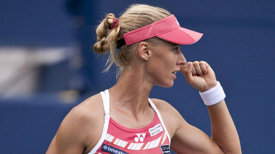 Elena Dementieva Celebrating A Victory With A Fist Pump Wallpaper