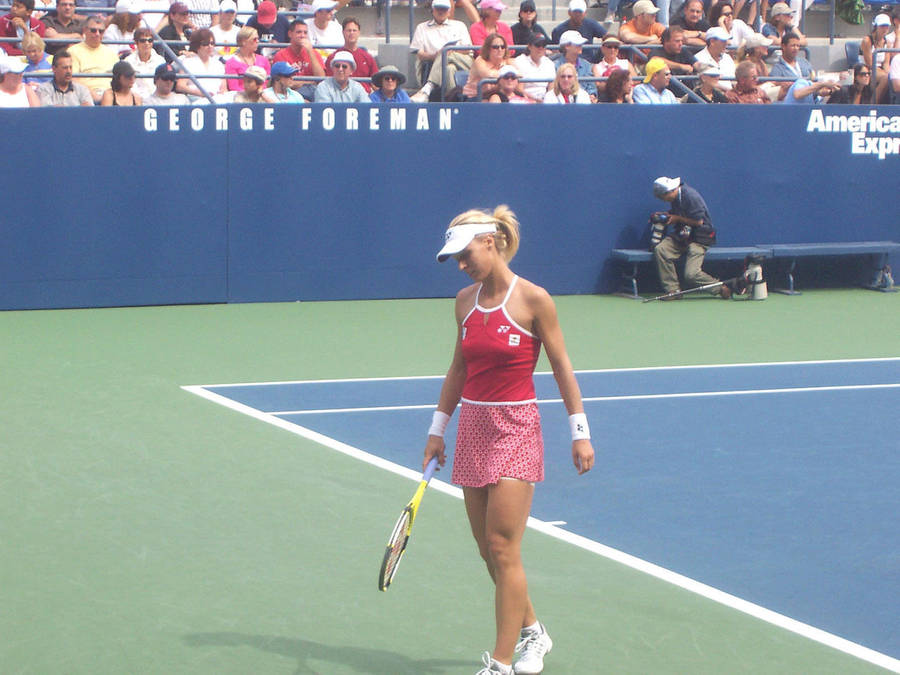 Elena Dementieva On Tennis Field Wallpaper