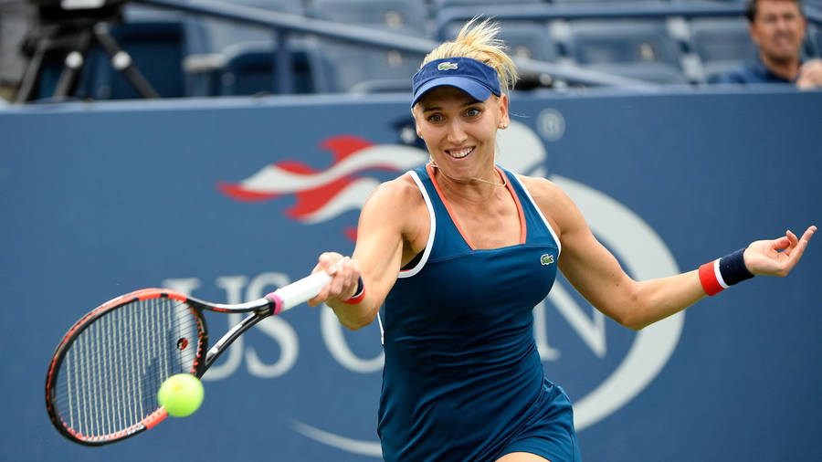 Elena Vesnina Hitting Ball Wallpaper