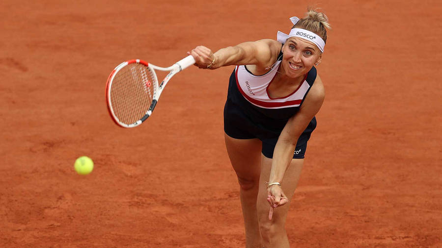 Elena Vesnina Reaching For Ball Wallpaper