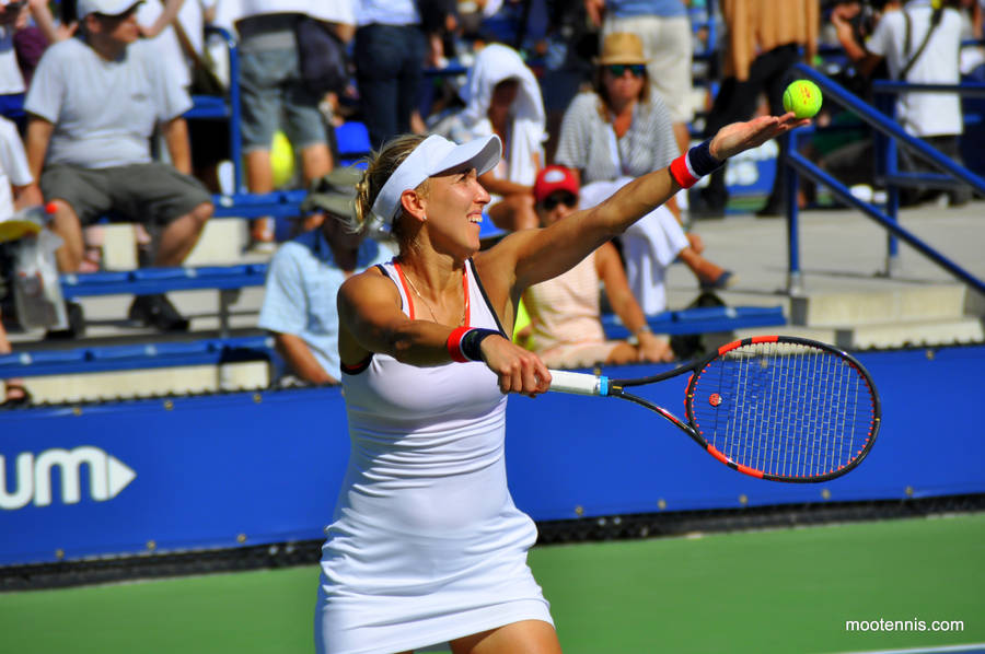 Elena Vesnina Serving Tennis Ball Wallpaper