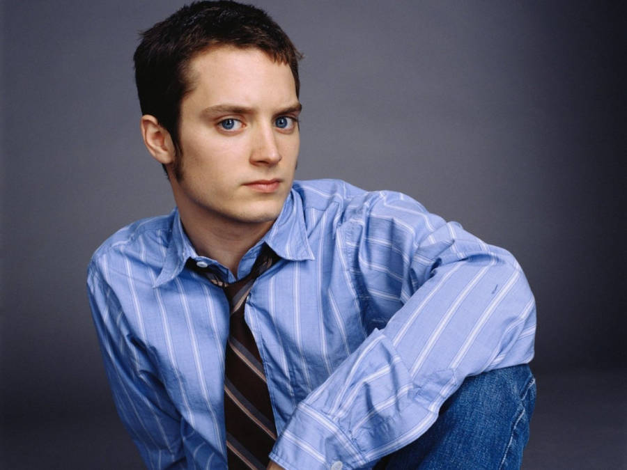 Elijah Wood In Blue Wallpaper