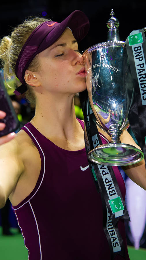 Elina Svitolina Kissing Her Trophy Wallpaper