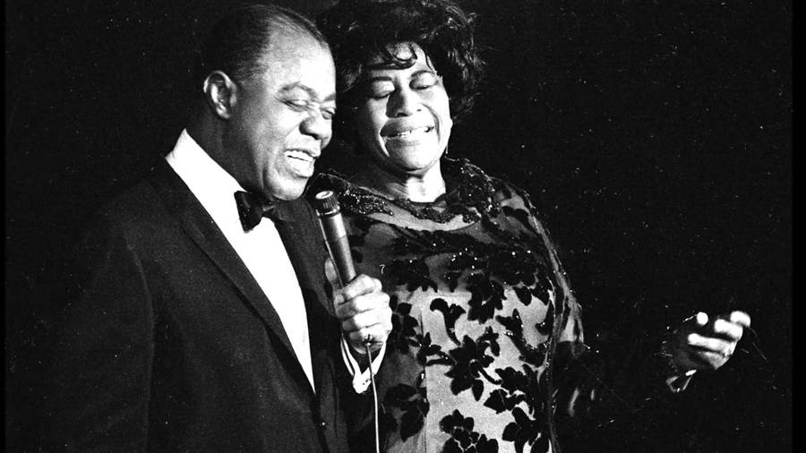 Ella Fitzgerald Performing With Louis Armstrong Wallpaper