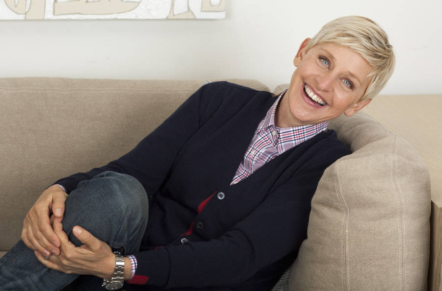 Ellen Degeneres Seated On A Couch Wallpaper