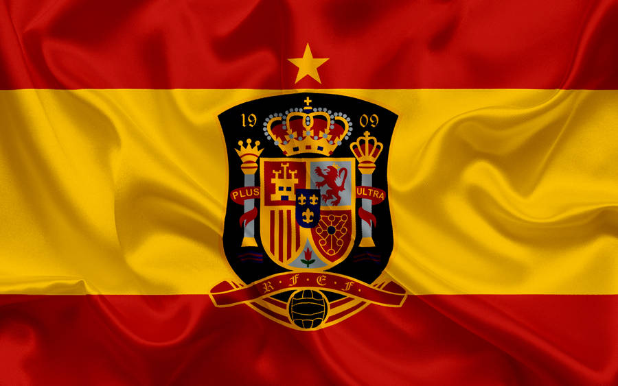 Embodying Spirit & Pride - Spain National Football Team Emblazoned Insignia Wallpaper