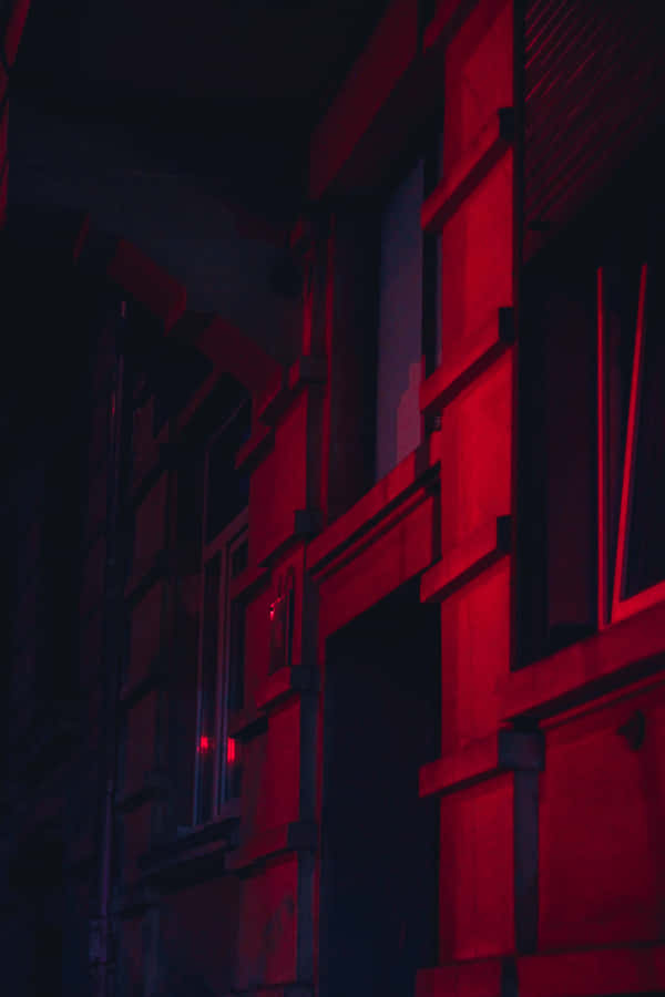 Embrace The Bold And Mysterious Dark Red Aesthetic Wallpaper