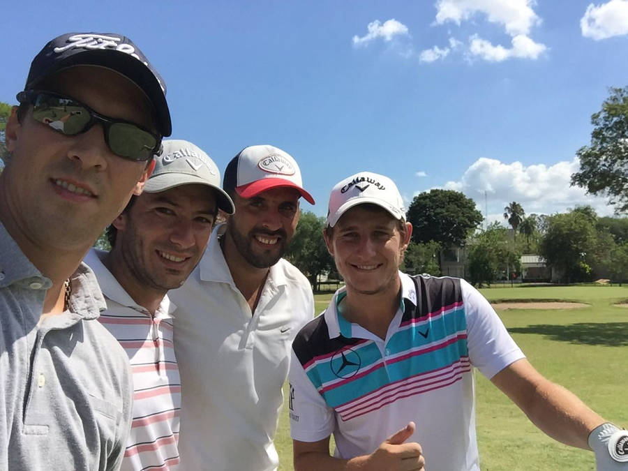 Emiliano Grillo Taking A Long Shot On The Golf Course Wallpaper