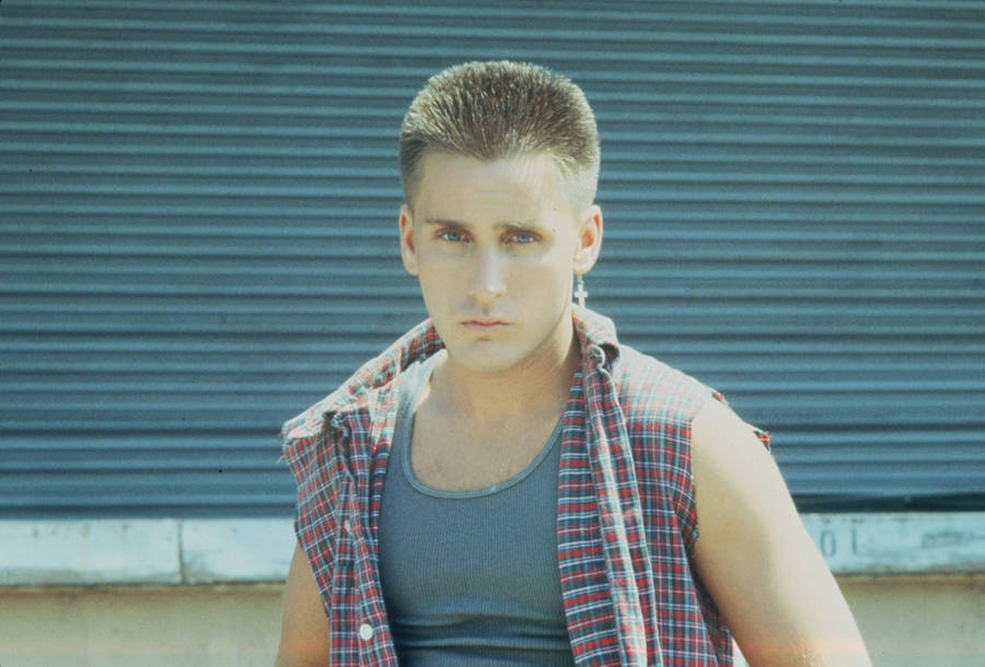 Emilio Estevez As The Rebellious Otto Maddox In Repo Man Wallpaper