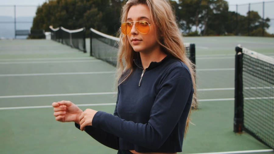 Emma Chamberlain Tennis Court Photoshoot Wallpaper