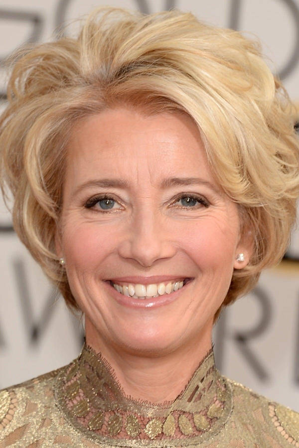 Emma Thompson In Gold Attire Wallpaper