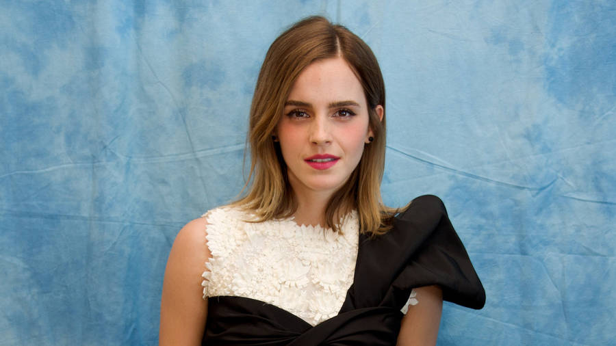 Emma Watson In Ruffled Dress Wallpaper