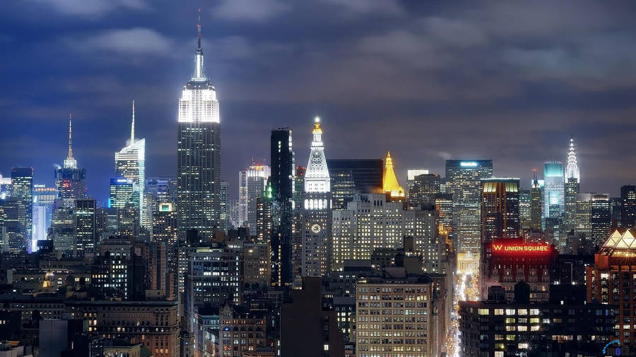 Empire State Building In Bright City Wallpaper