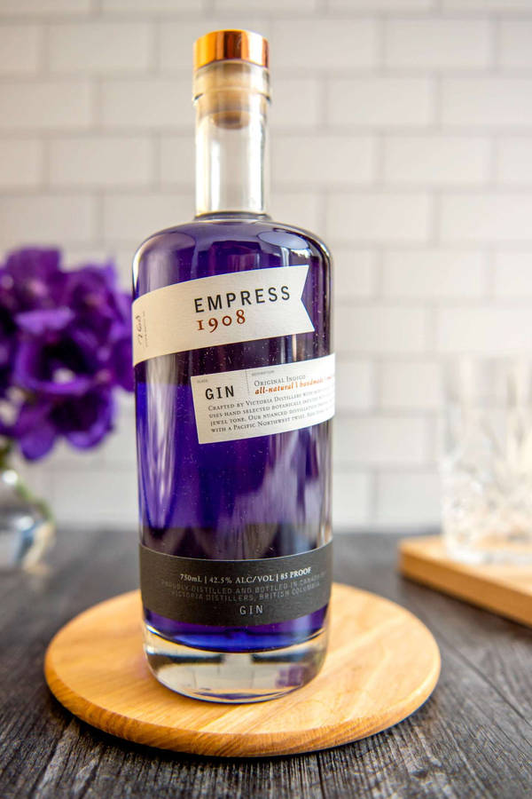 Empress Gin On Wooden Dish Plate Wallpaper