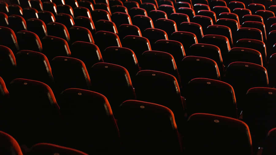 Empty Cinema Seats Dark Ambience Wallpaper