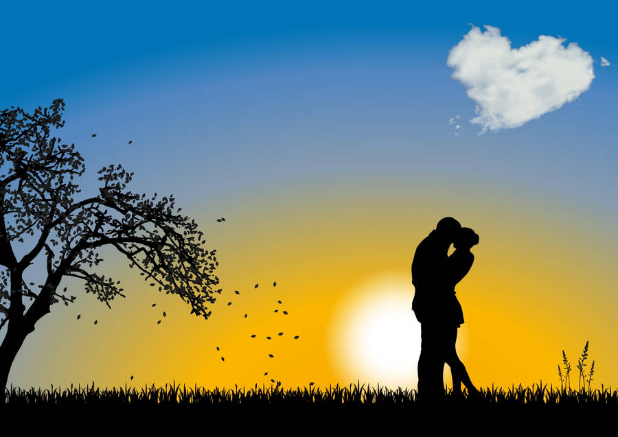 Enamored Couple Enjoying A Beautiful Sunset Wallpaper