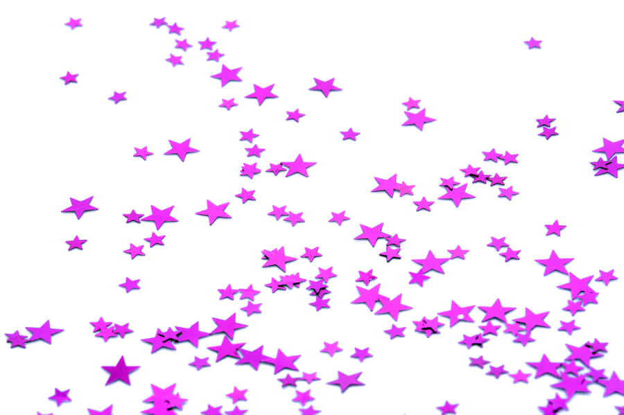 Enchanting Pink Stars In The Night Sky Wallpaper