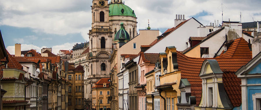 Enchanting Views Of Old Prague Houses Wallpaper