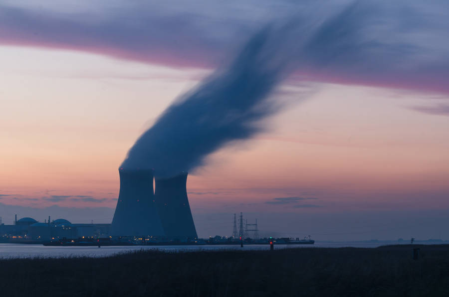 Energy Plant With Billowing Smoke Wallpaper