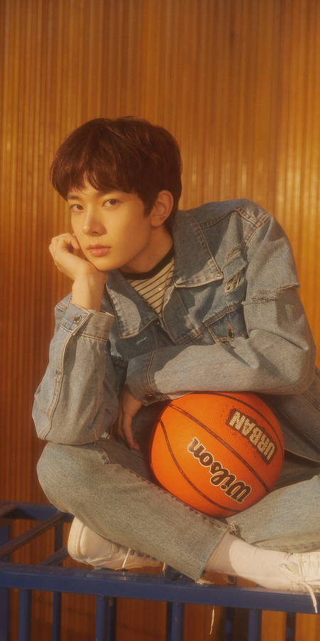 Enhypen Member Heeseung With Basketball Wallpaper